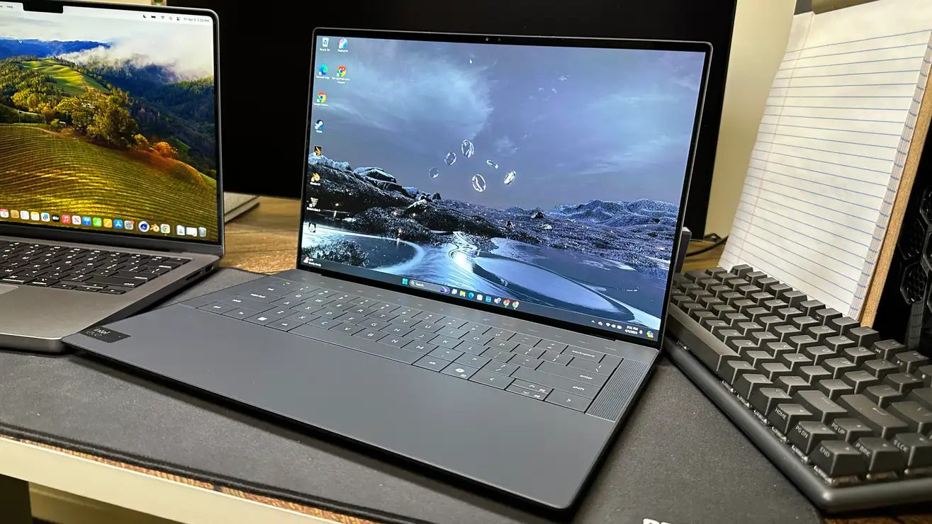 标题为 Apple MacBook Pro 14 与 Dell XPS 14：谁在舒适性和创造力方面获胜