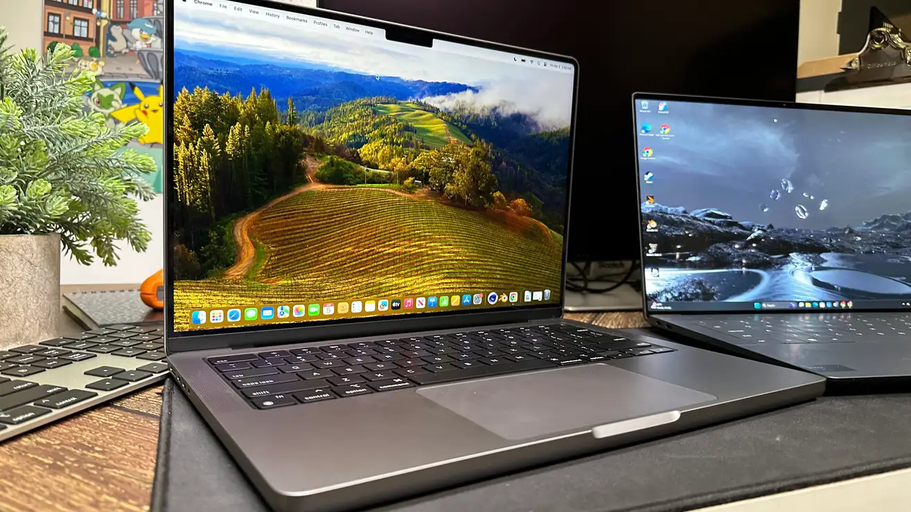 标题为 Apple MacBook Pro 14 与 Dell XPS 14：谁在舒适性和创造力方面获胜